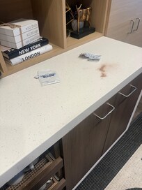 Garbage on coffee counter.