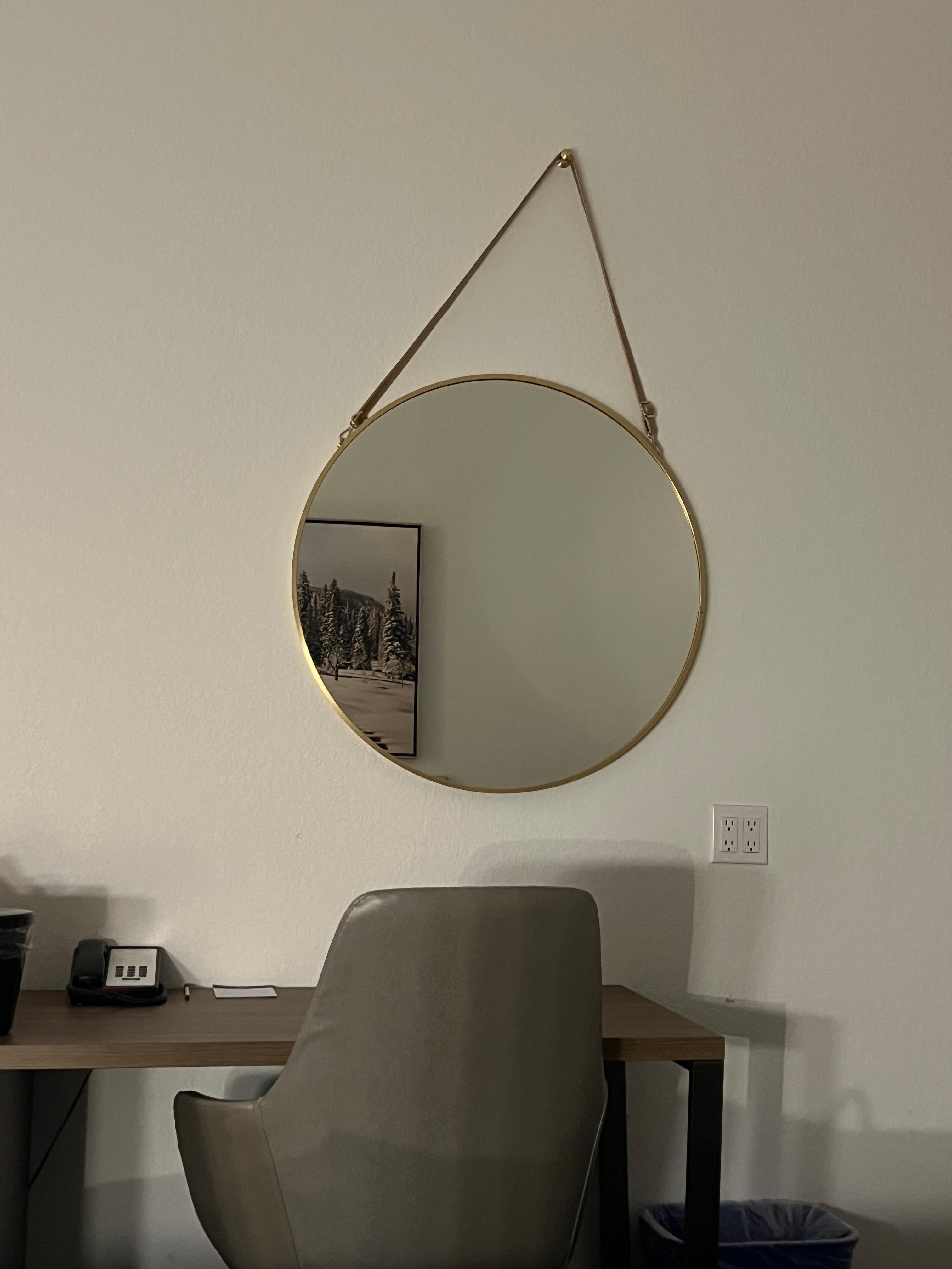 The cricket mirror drove me crazy and couldn’t fix it because it’s secured to the wall not just hanging by that strap.