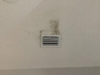 Dark material at some of the a/c vents