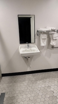 Bath sink with mirror but no counter or outlet