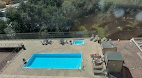 Outdoor pool and jacuzzi on 2nd floor