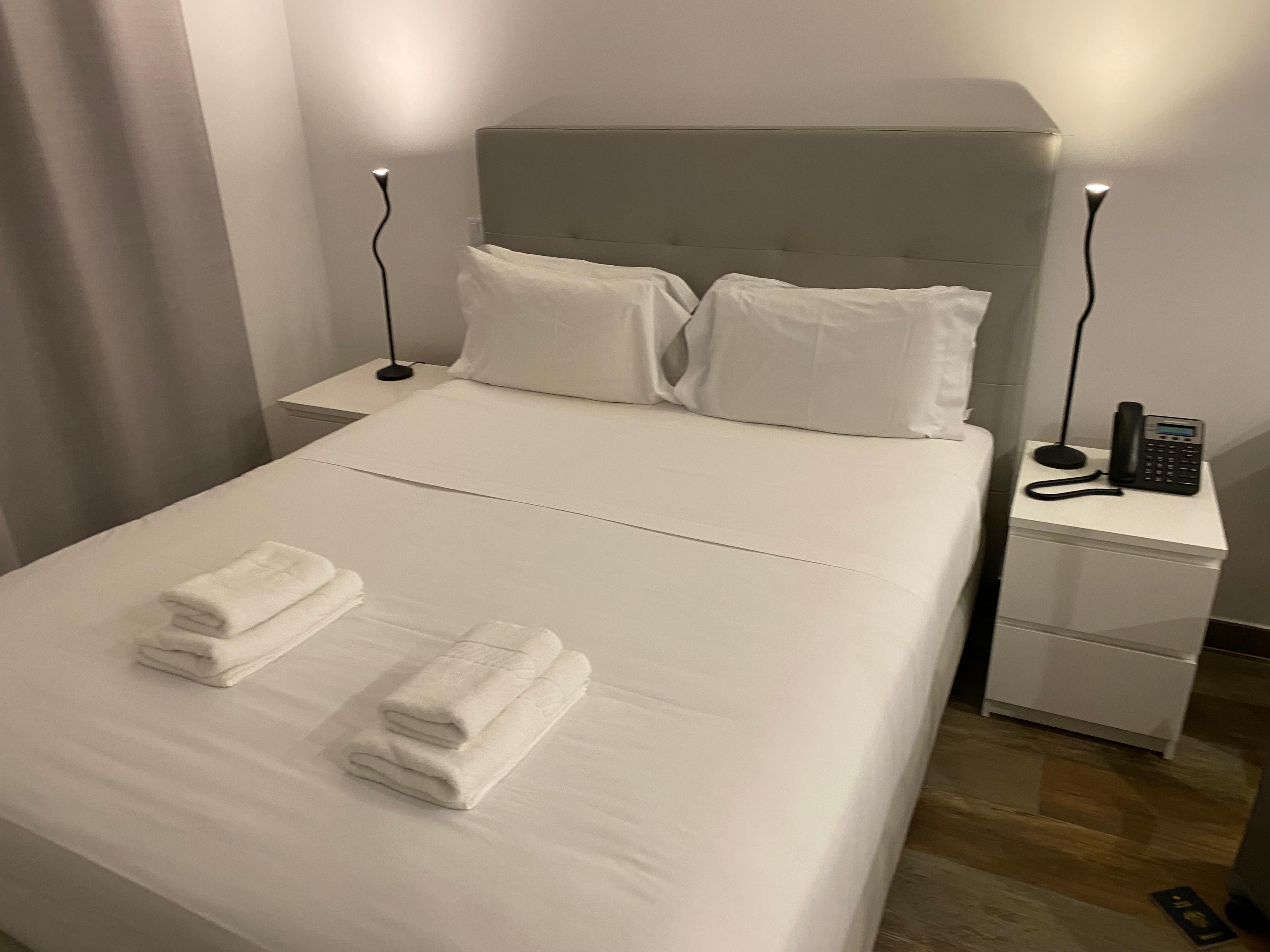 There is a veranda with a little table outside.