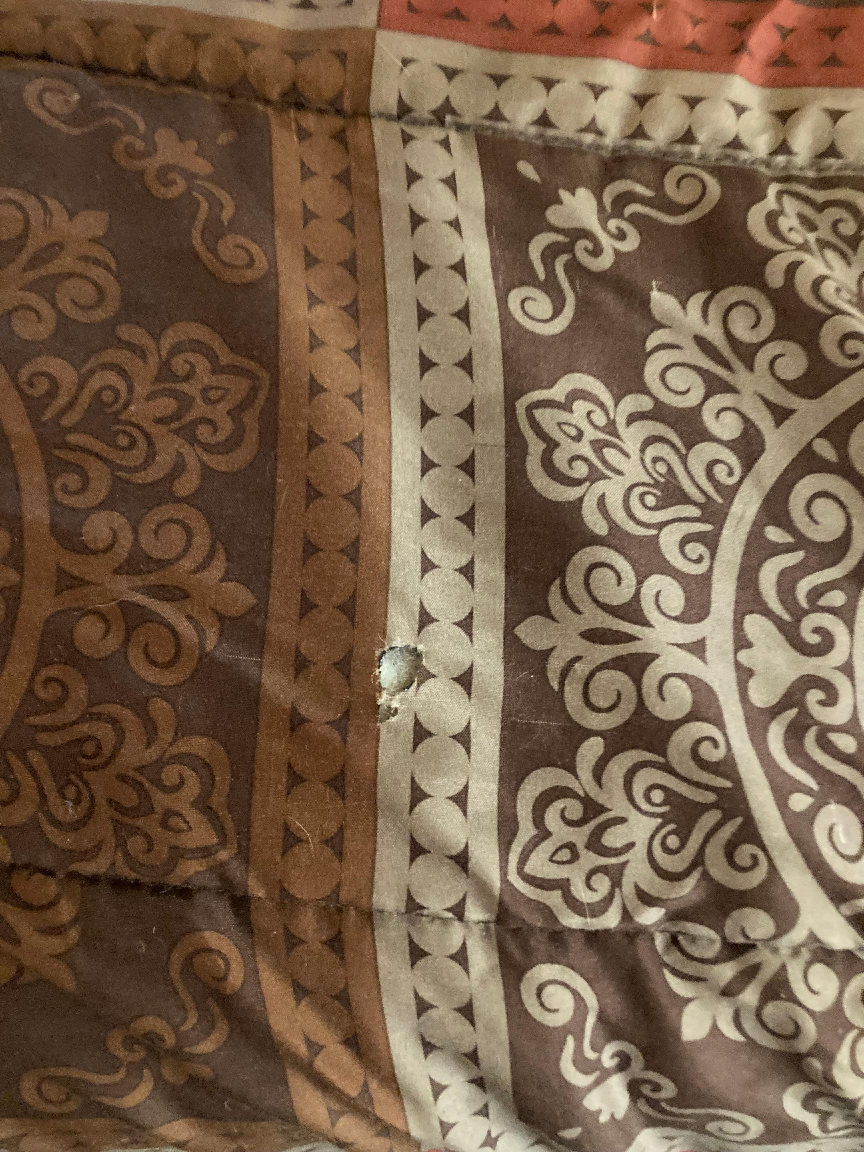 Bed spread holes