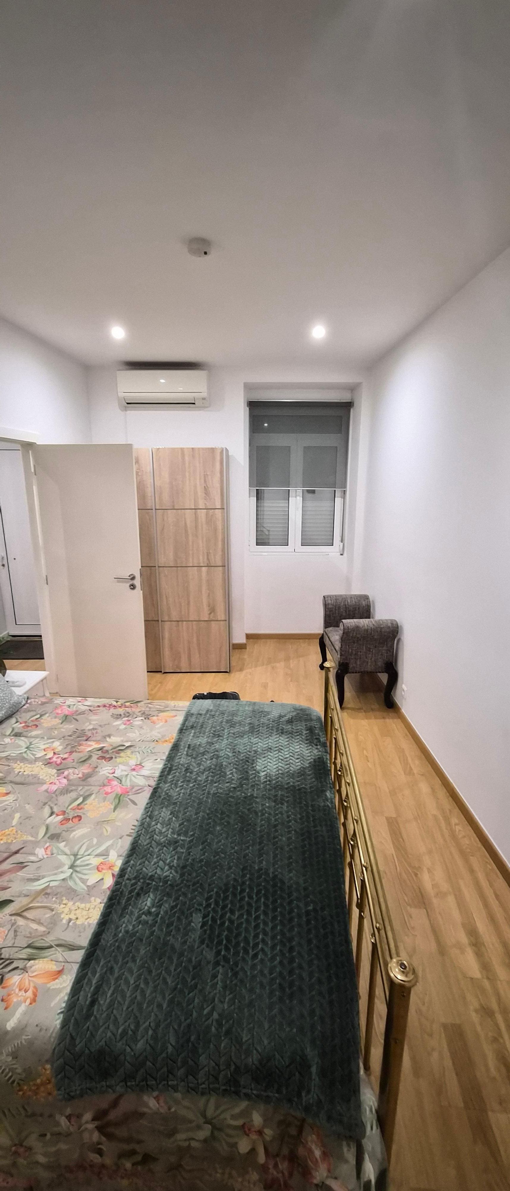 Bedroom with AC unit