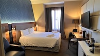 Zimmer mit Queensize Bett und Schlafcouch