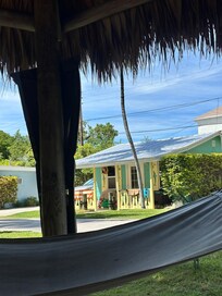 The tiki hut is a perfect place to relax and enjoy the evening sunset