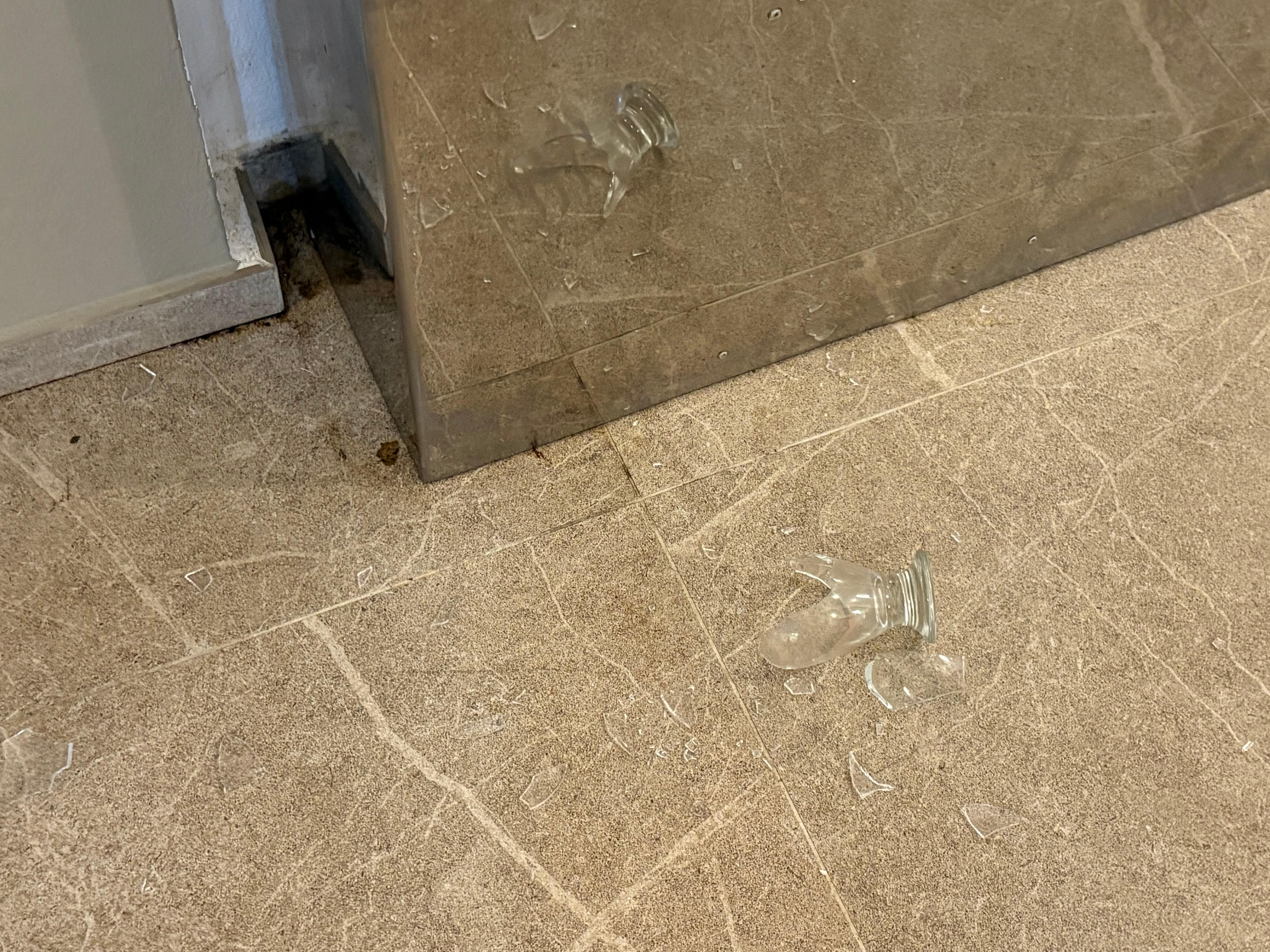 Glass broken outside elevator which took asking to have it cleaned before anything was done 