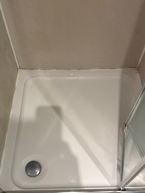 Mold in shower pan. Also at the handle and ceiling.