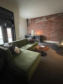 Huge living space separate from bed ( in adjoining space)