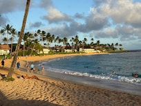Beach in front of resort pool area.