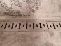 Cracked drain cover in shower