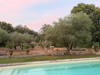 Beautiful sunsets among the flowers and trees from poolside.