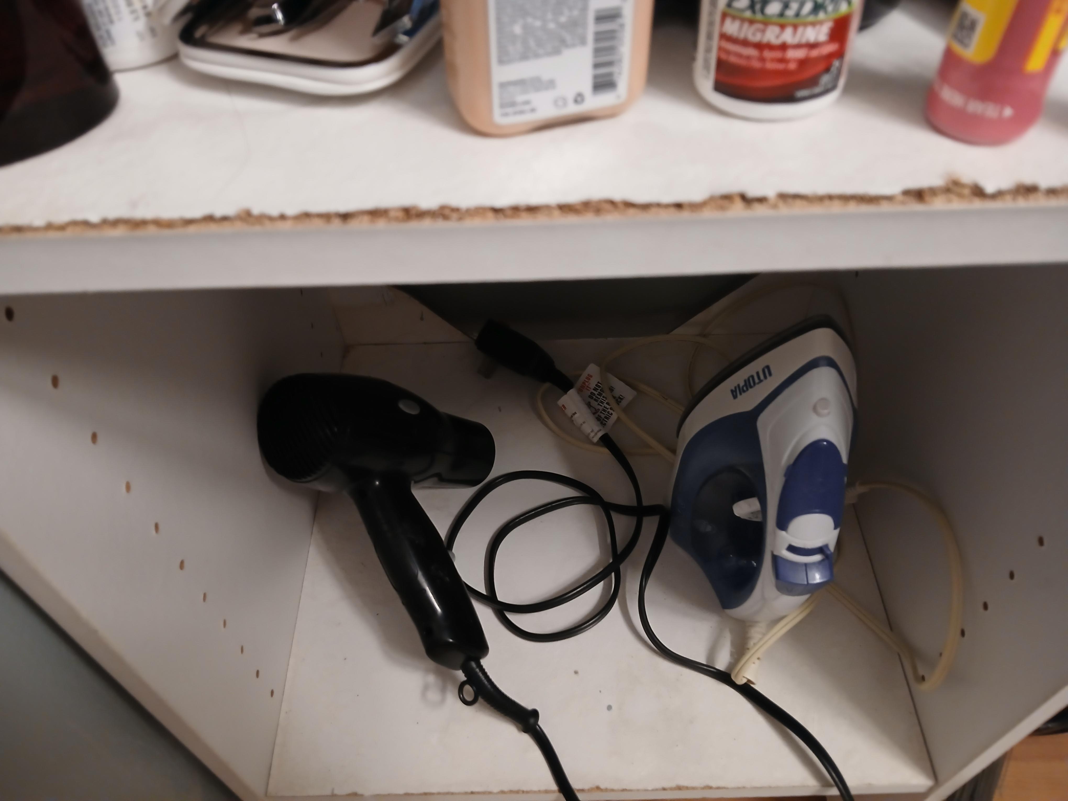 Gross shelf peeling because the entire bathroom got soaked when you showered 