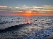 Sunset from the stairs going down to the beach