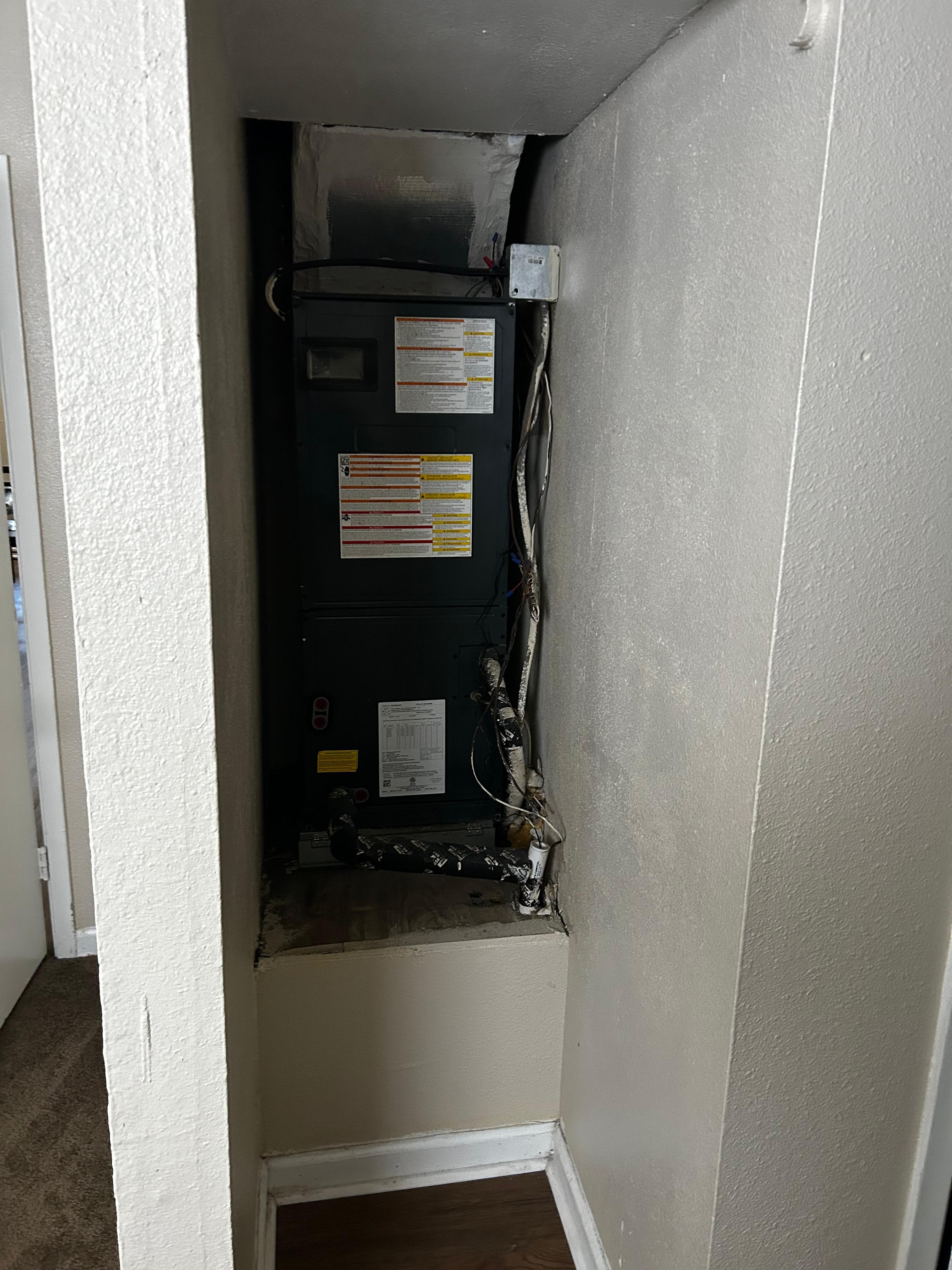 AC/furnace unit exposed in the bedroom