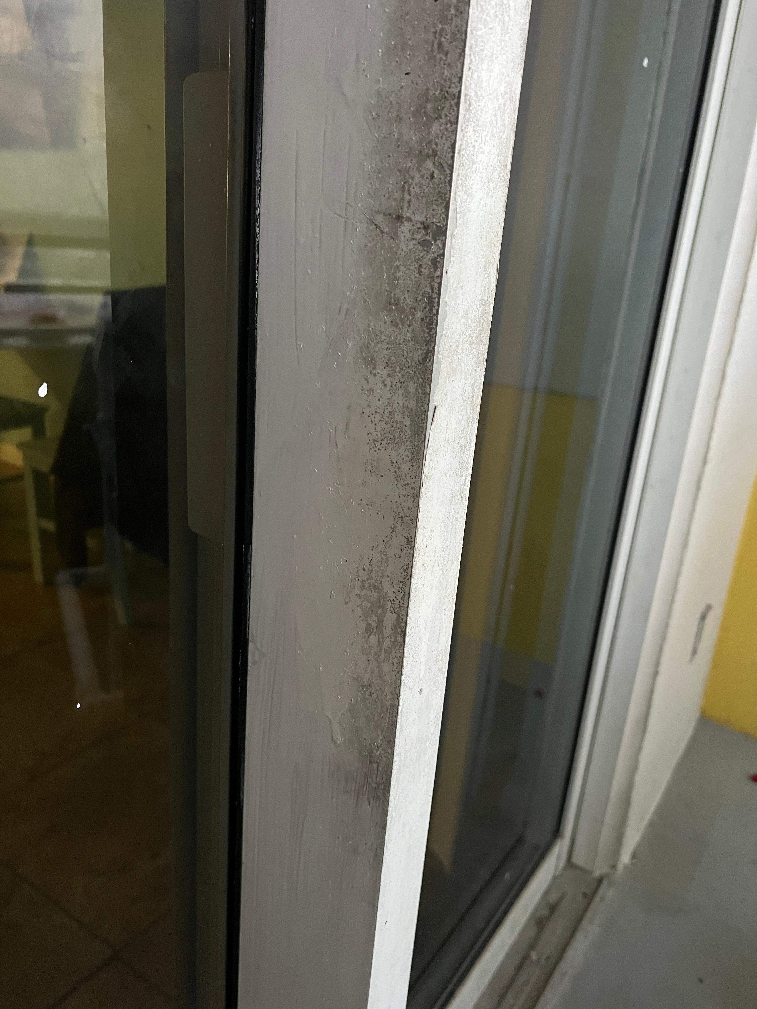 Dirty balcony door (unit 505)