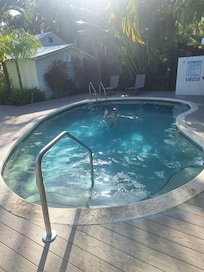 Enjoying a swim in the heated pool after coffee and juice served in the gardens. It's a good life!