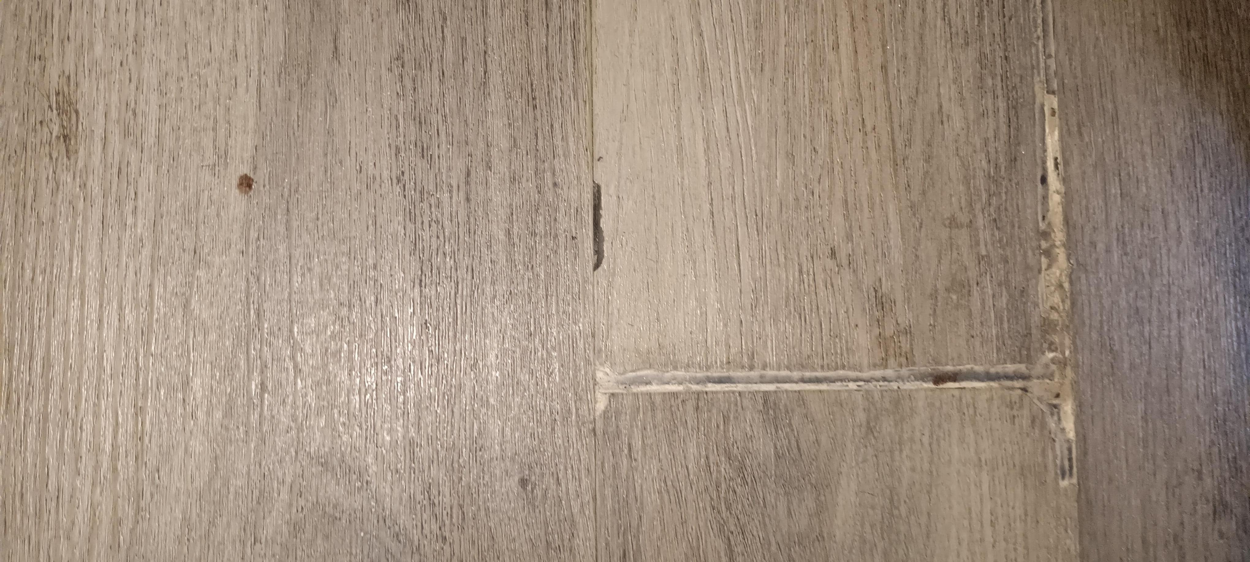 Floor was not secured and could easily pinch a barefoot. 