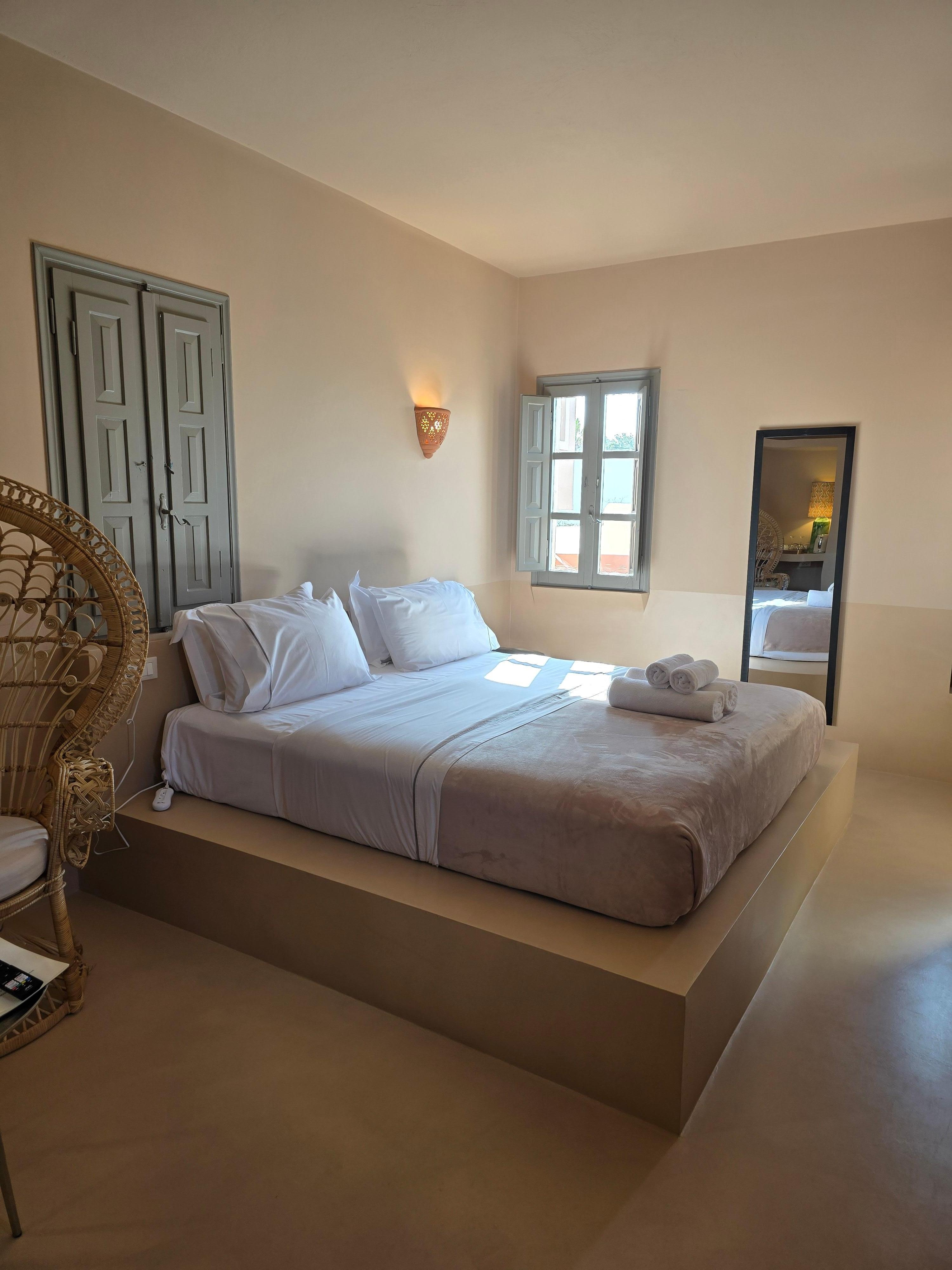 The room and bathroom were spacious and the bed was very comfortable. Tea and coffee were provided and a small refrigerator was useful. 