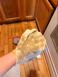 After sweeping then scrubbing just the area by the sink on my hand and knees.