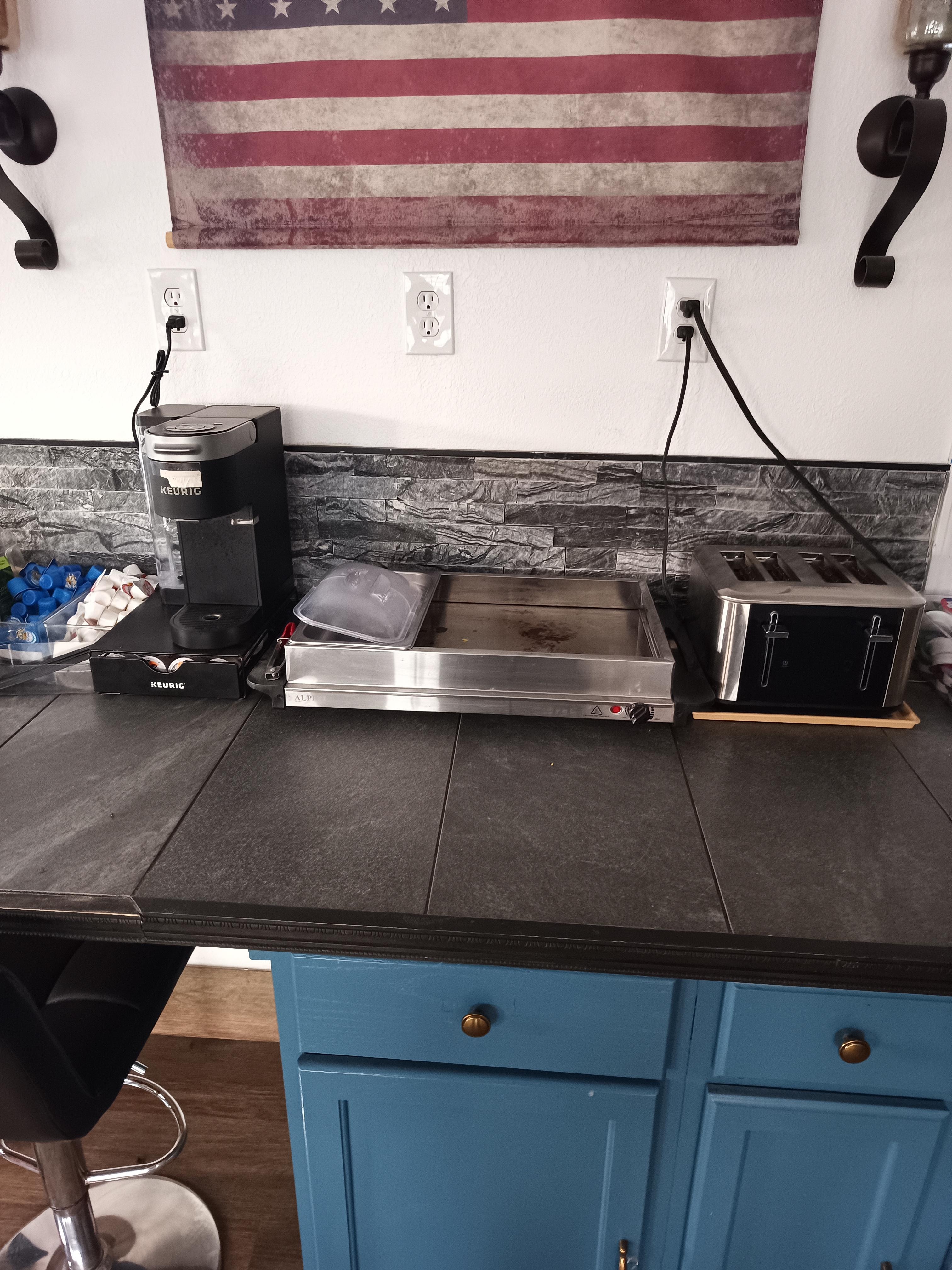 The breakfast area when we were leaving in the morning. Notice what's not there: breakfast! (Not that I would have trusted this filthy hole to feed me.)