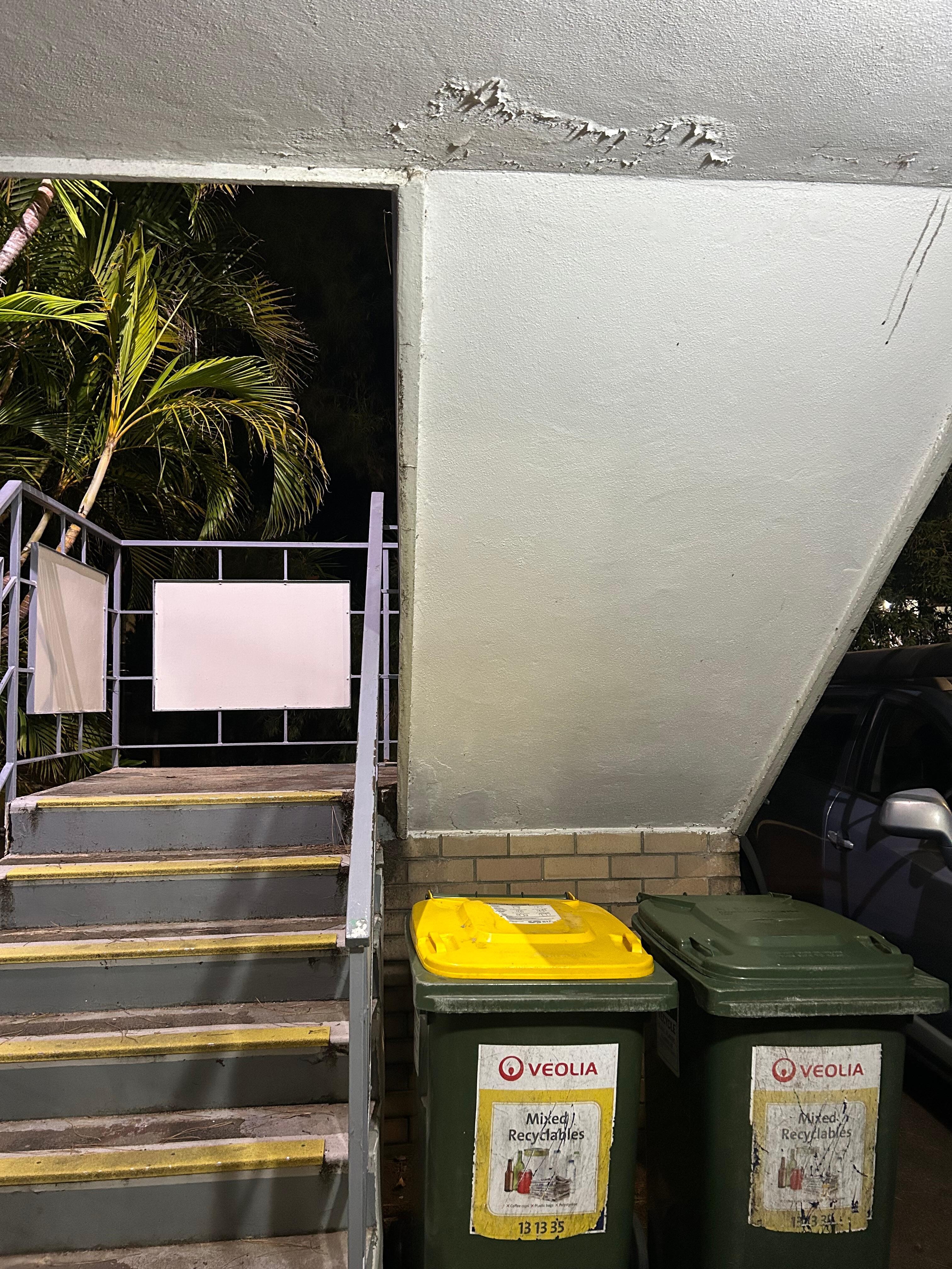 Right out my room with bins about a metre from the door to my room 