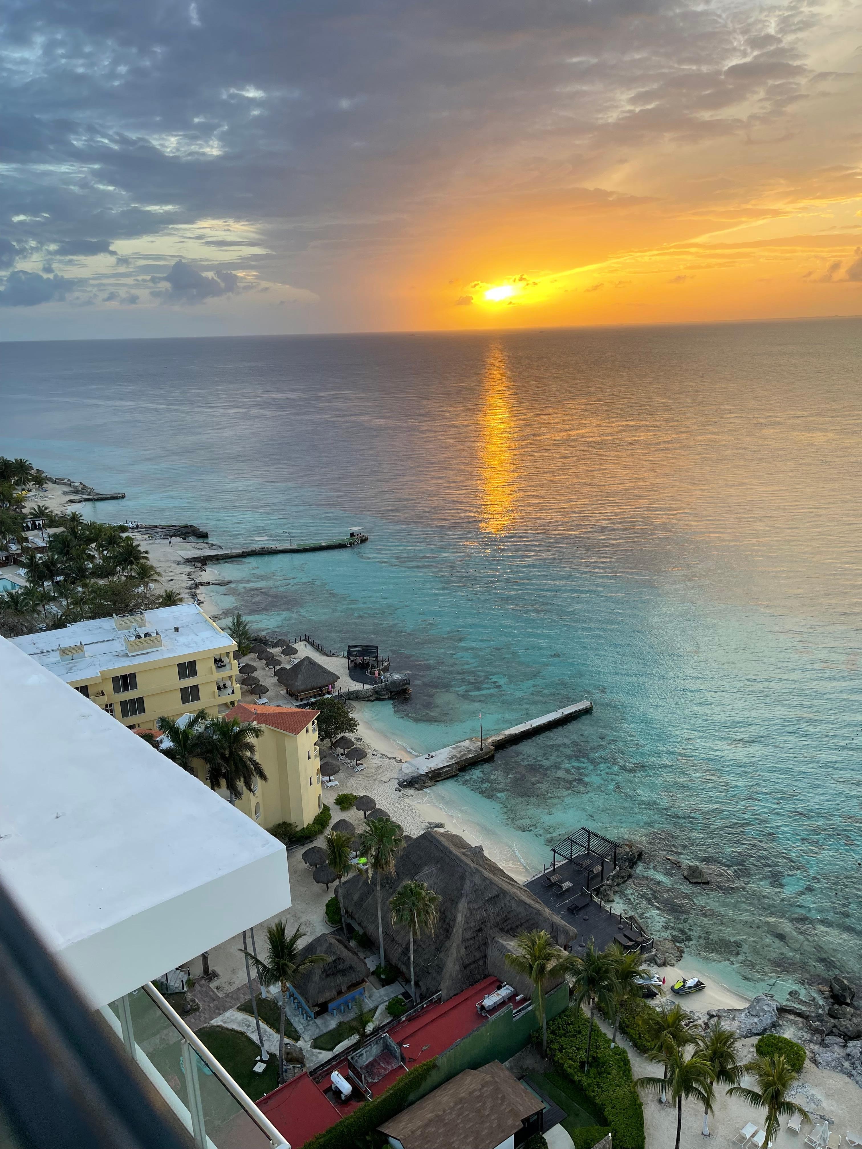 Sunset from roof top bar and pool. 