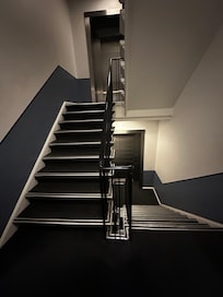 You gave to go up or down a flight of stairs to access the lift