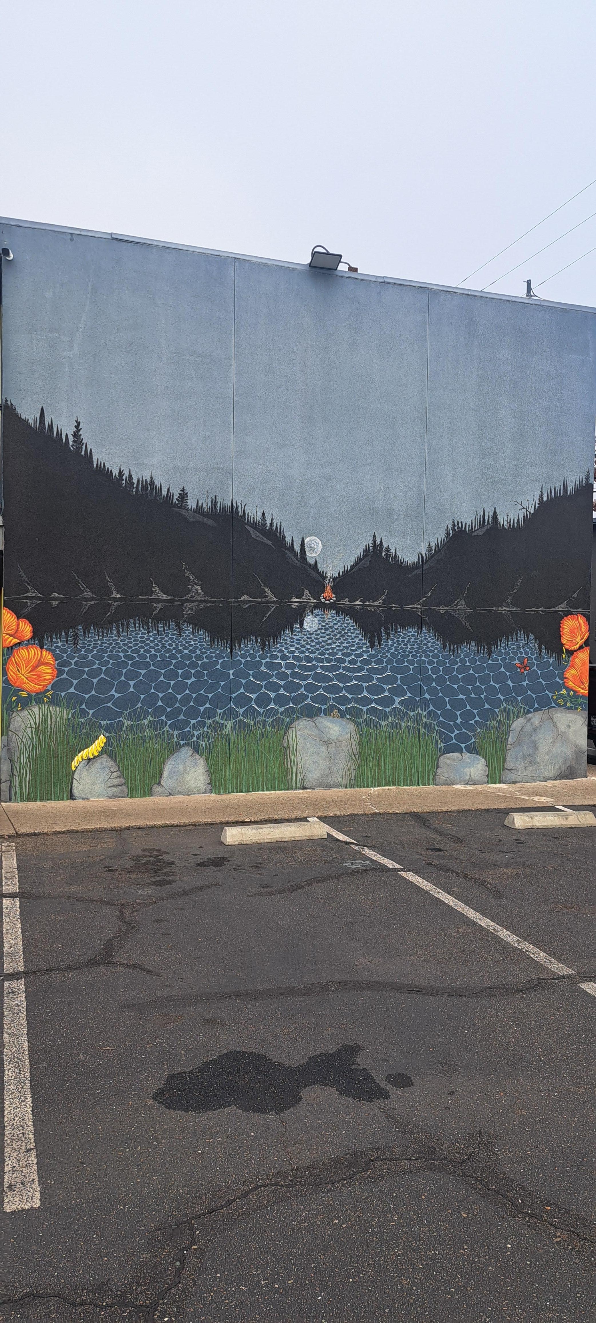 Mural on side of building.