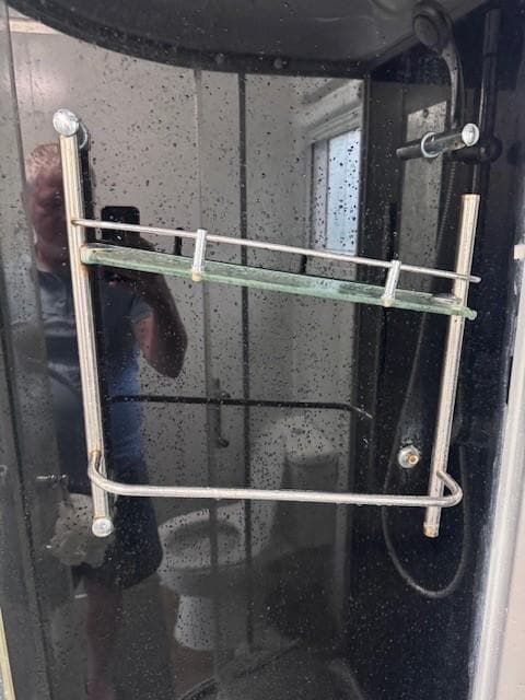 Broken shower caddy. Owner said he would figure something out but never did.