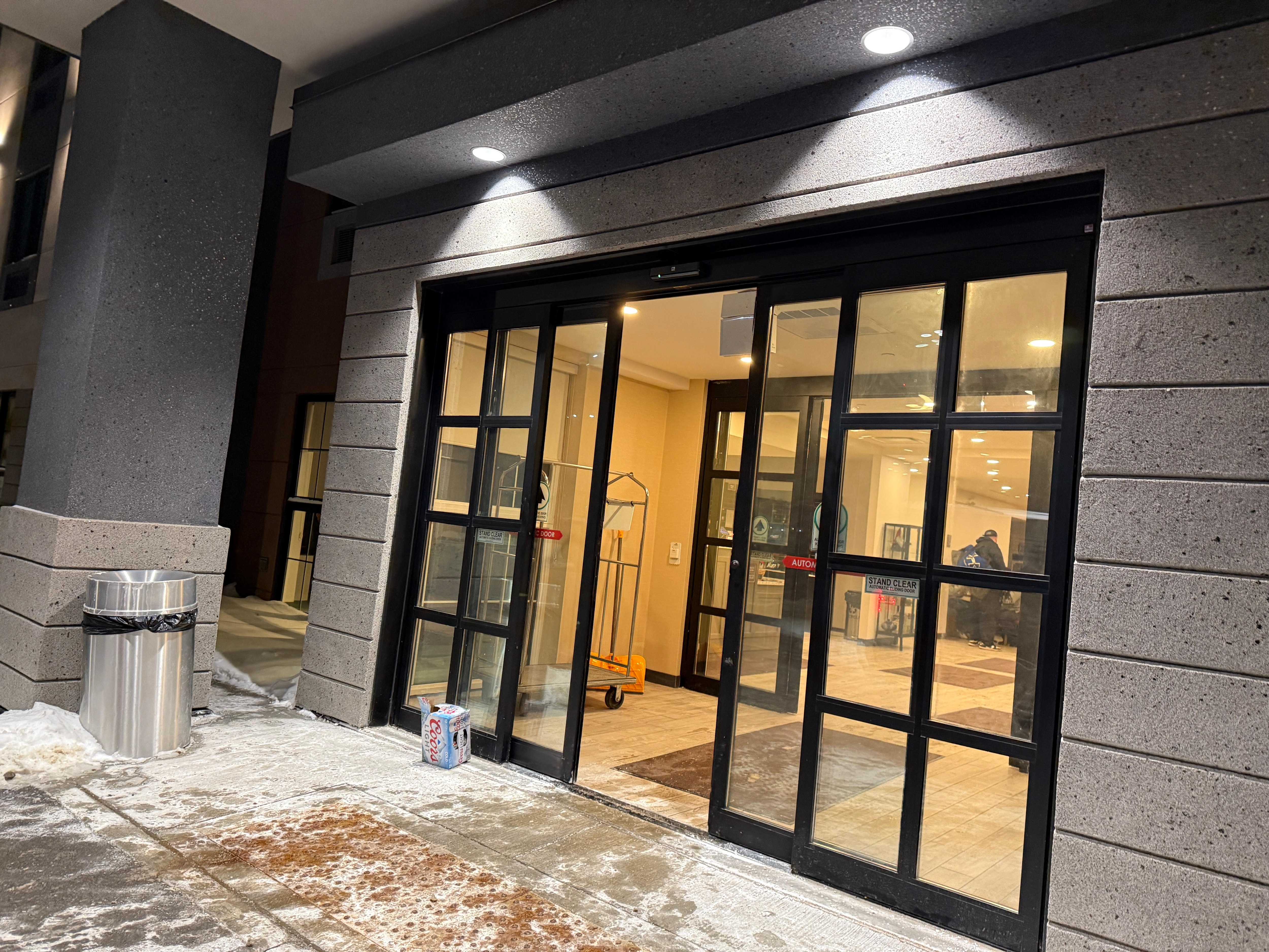 Alcohol anyone could grab in front of man exit. 