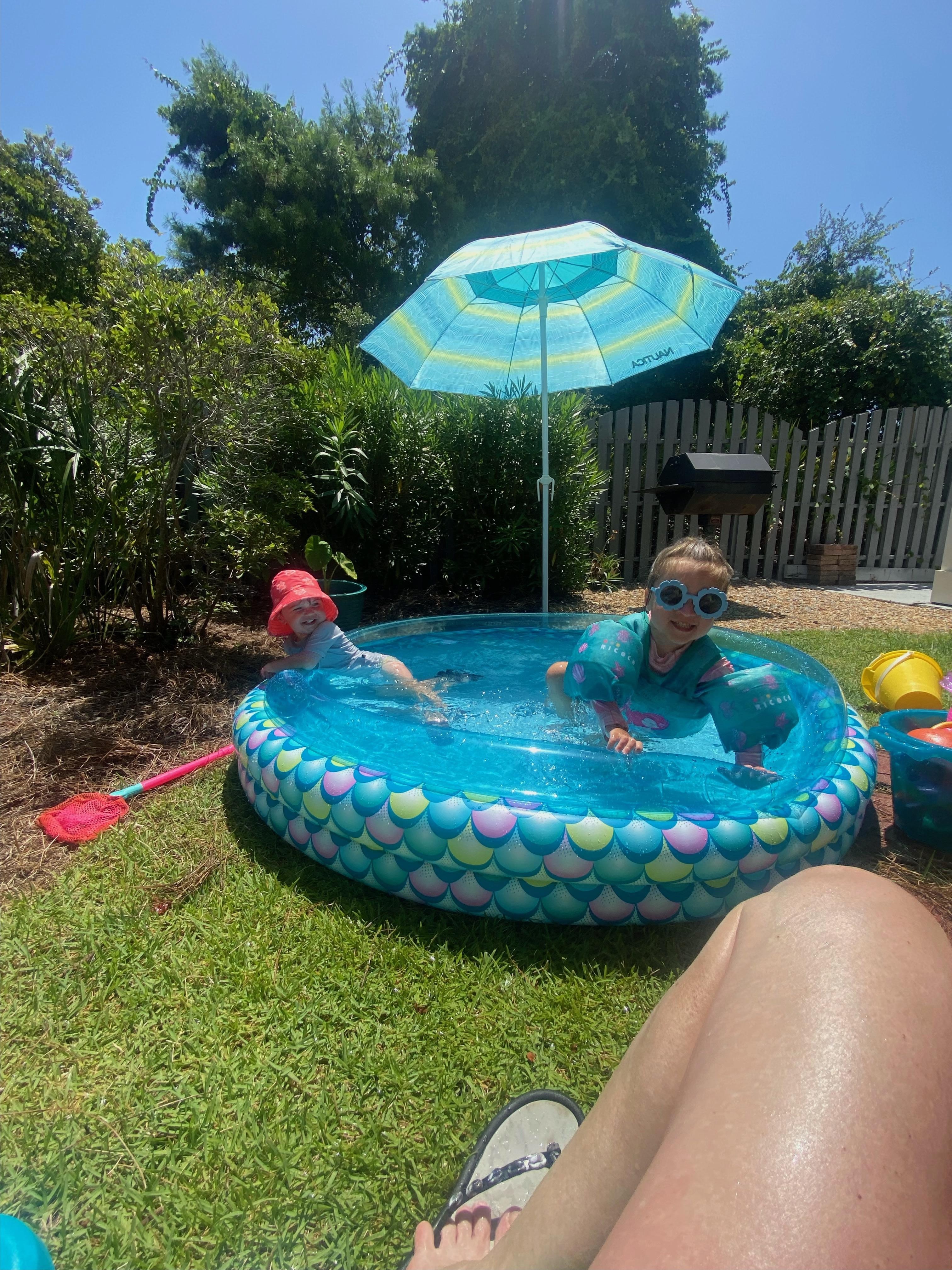 Bought a cheap pool for the dogs but the grandkids ended up using it.  Note: it wasn't there long and did not kill the grass.  
