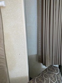 markings on the wall? dots and a huge X