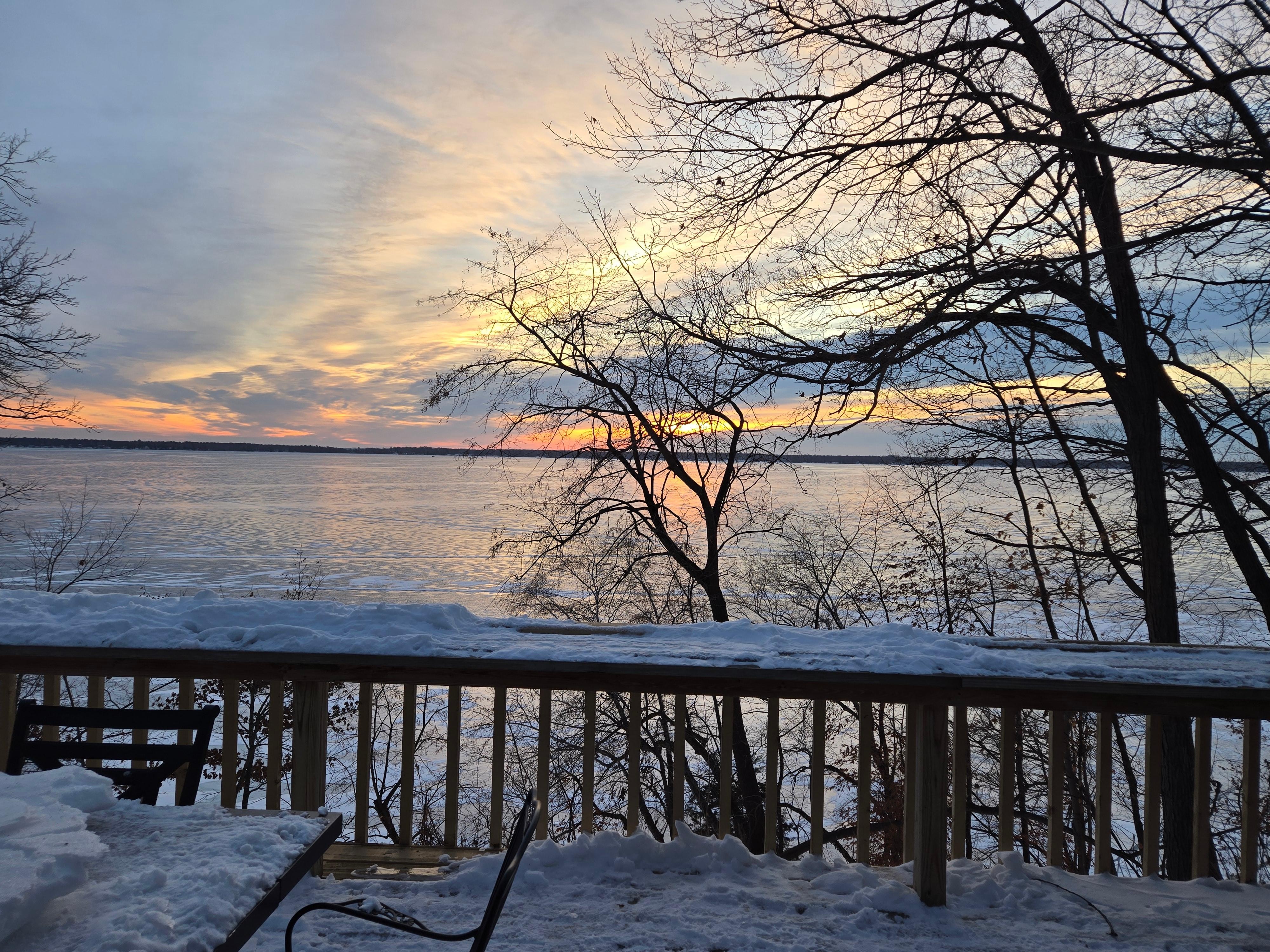 Balcony off the living room has a great view of the lake and sunrise.