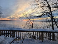 Balcony off the living room has a great view of the lake and sunrise.