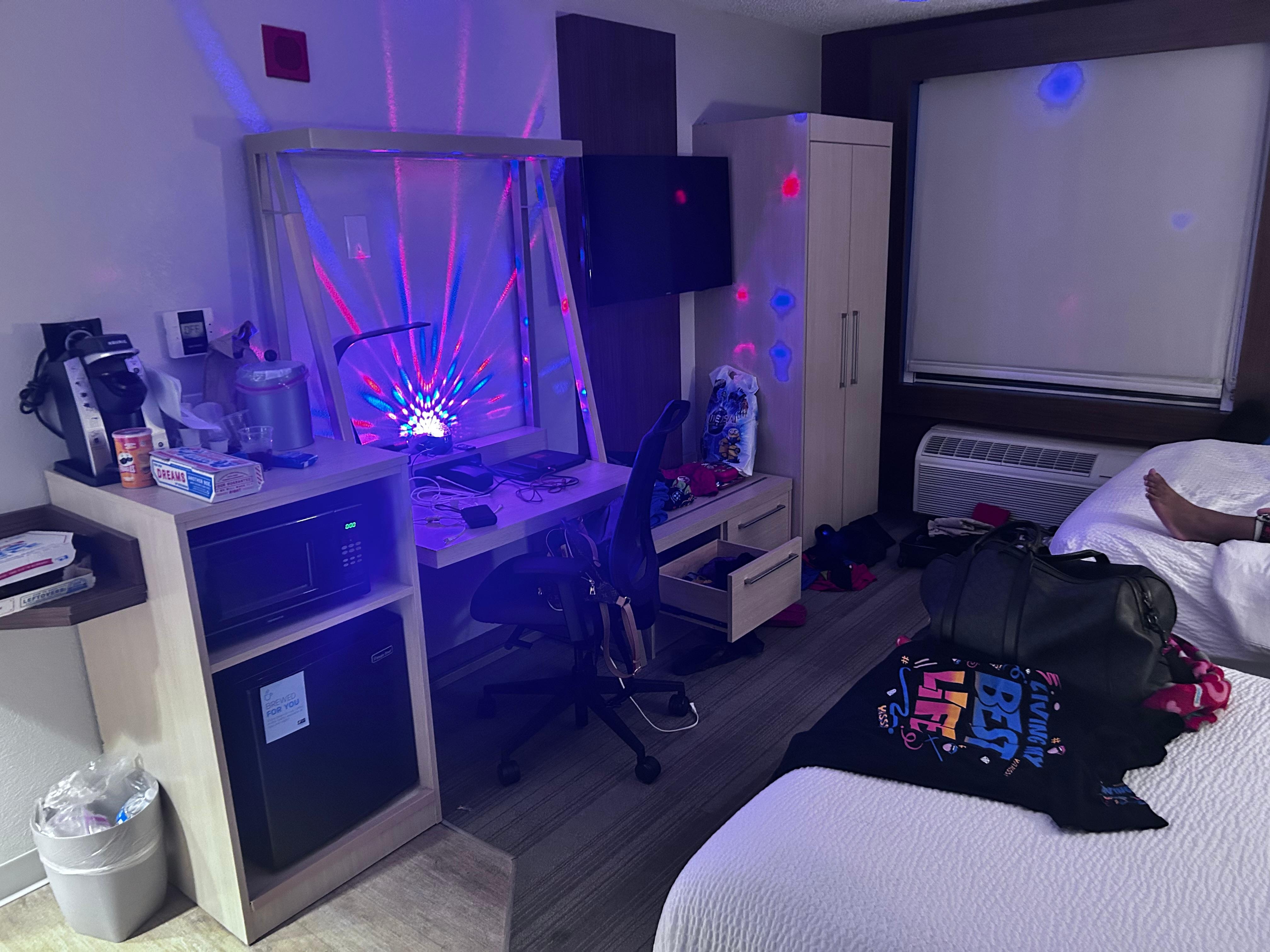 Our lovely hotel room! I added my son’s disco light thingy lol 
