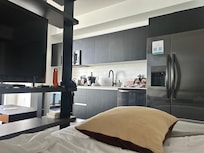 View from the king bed. Note full size refrigerator. Helpful for groceries to eat healthy