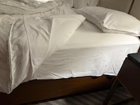 Drap contour flottant car trop court pour fixer dessous matelas