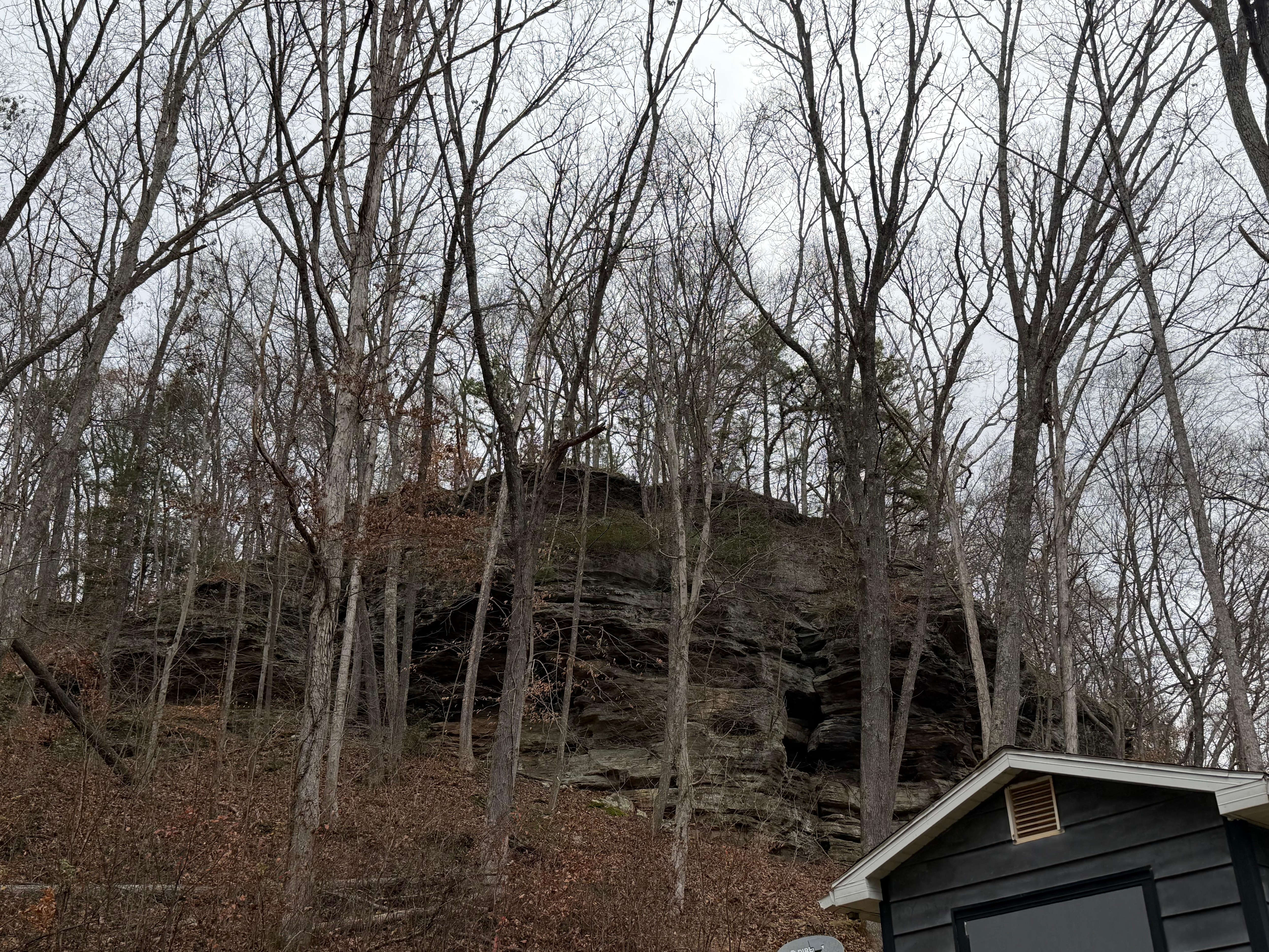 Rock cliff behind the cabin