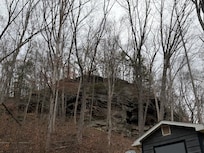Rock cliff behind the cabin