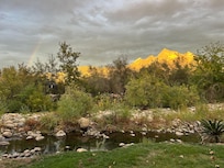 Rainbow after a rain at sunset.