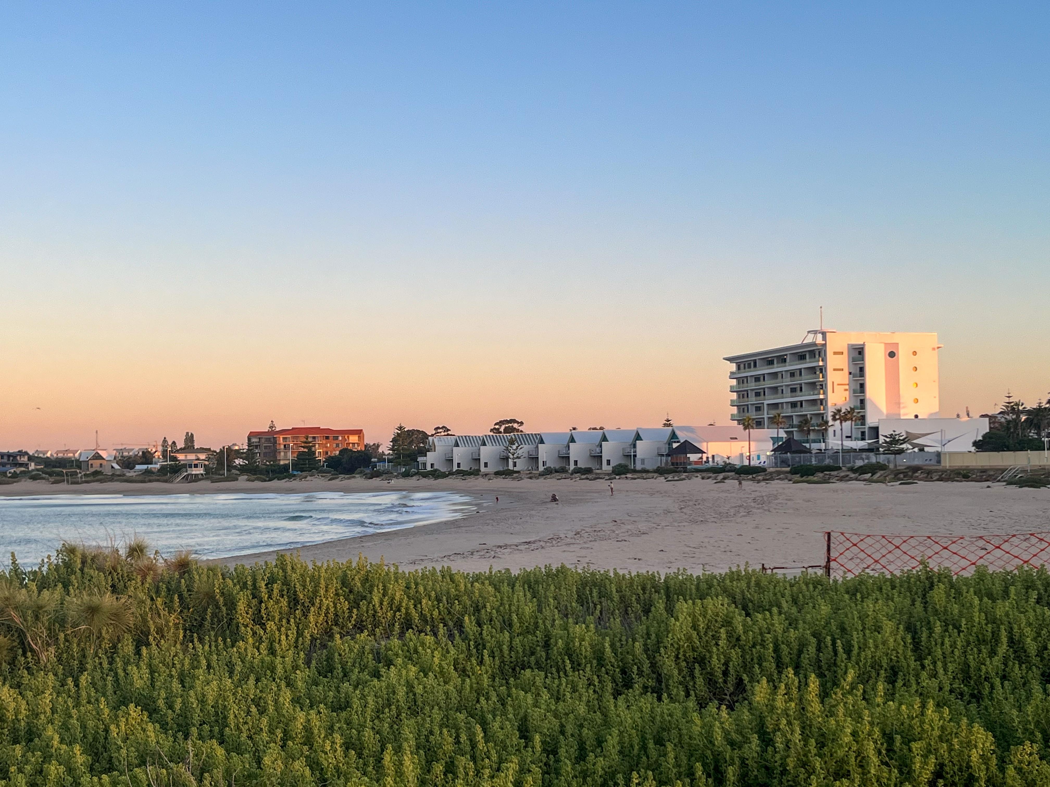 Hotel in the distance, on a sunset walk after dinner along the beachfront. There is direct beach access from the pool area at the back of the hotel.