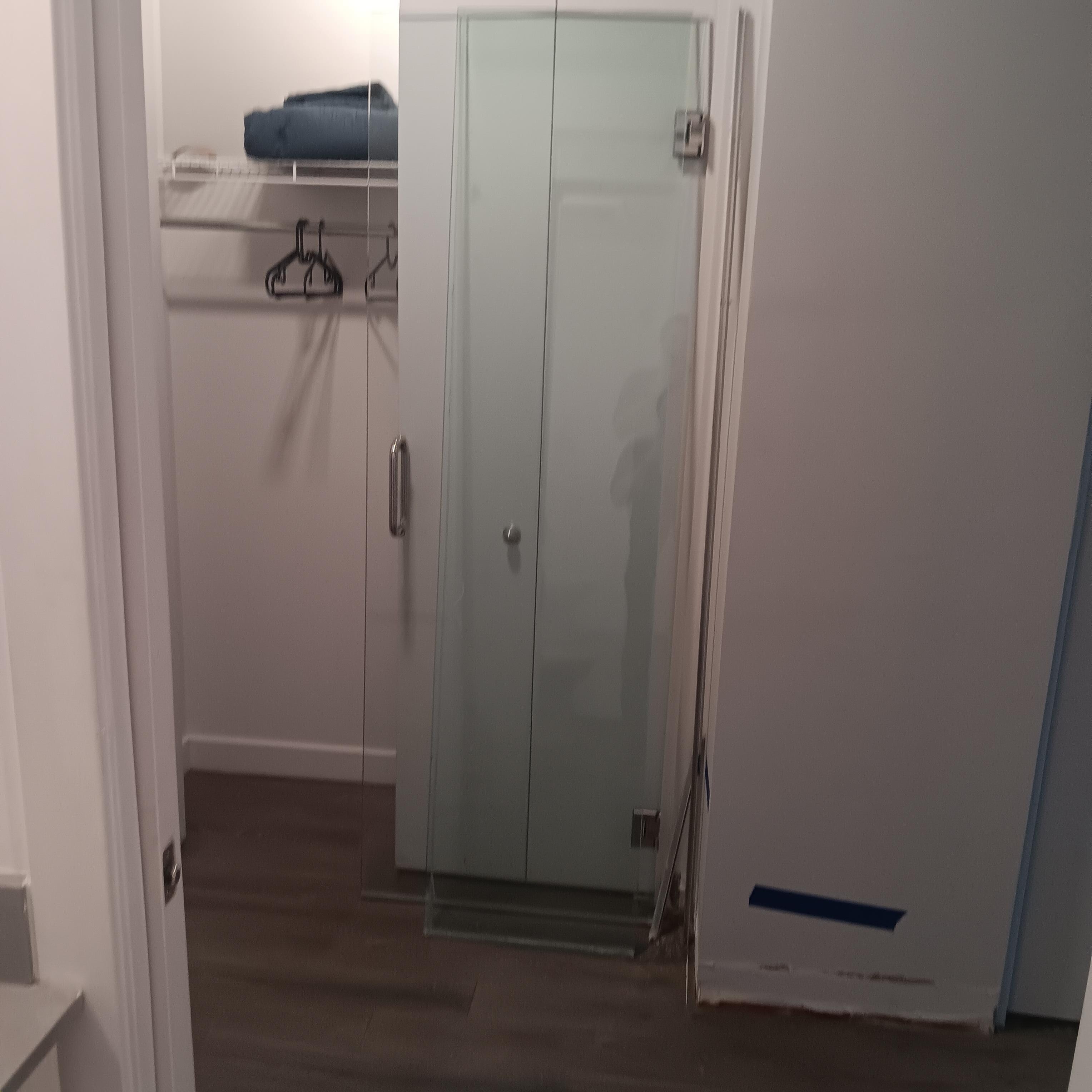 Shower glass doors in hallway 