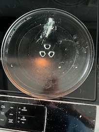 Microwave plate had melted food on it