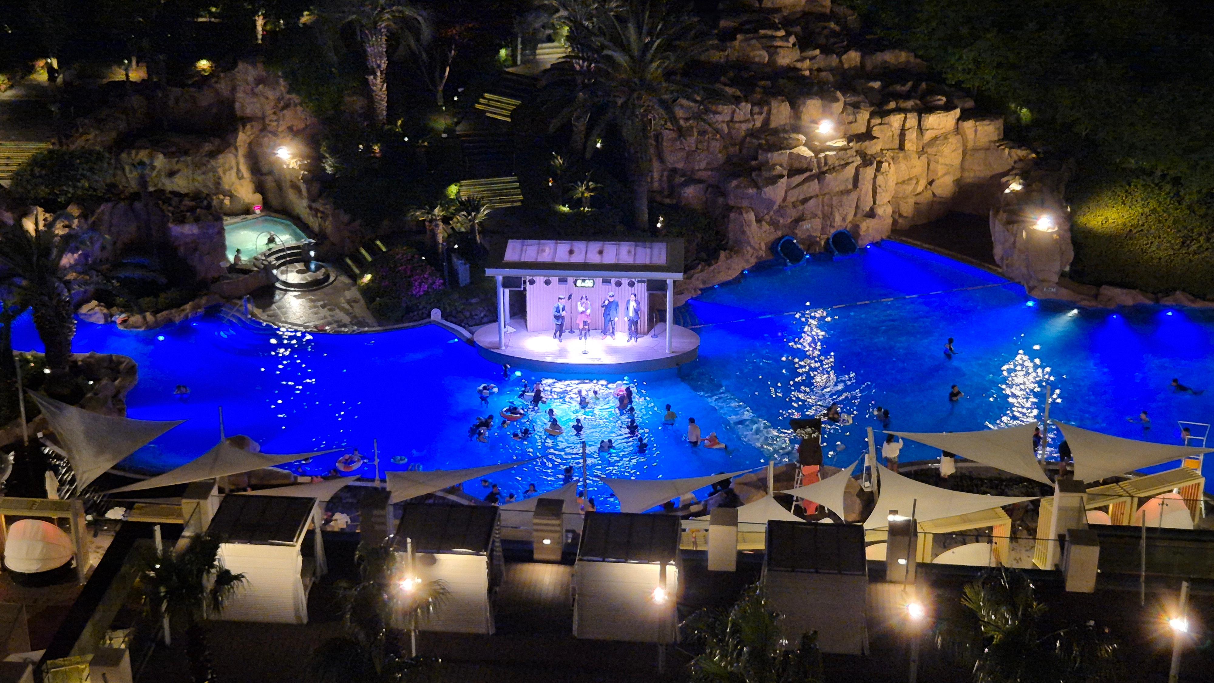 outdoor pool and performance stage -- available to hotel guests