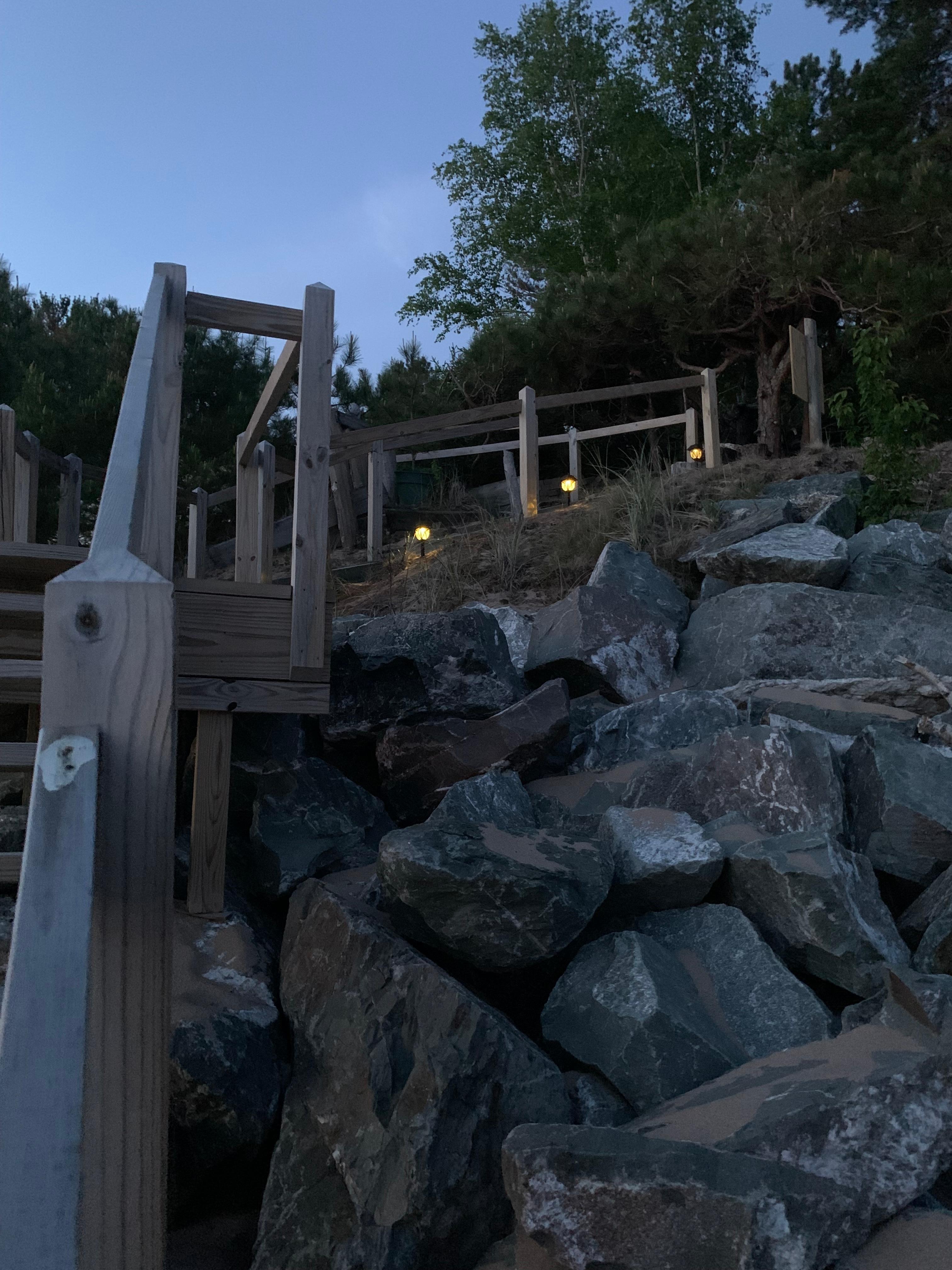 Taken from the beach just before sunrise.  The steps have solar lights and so pretty!