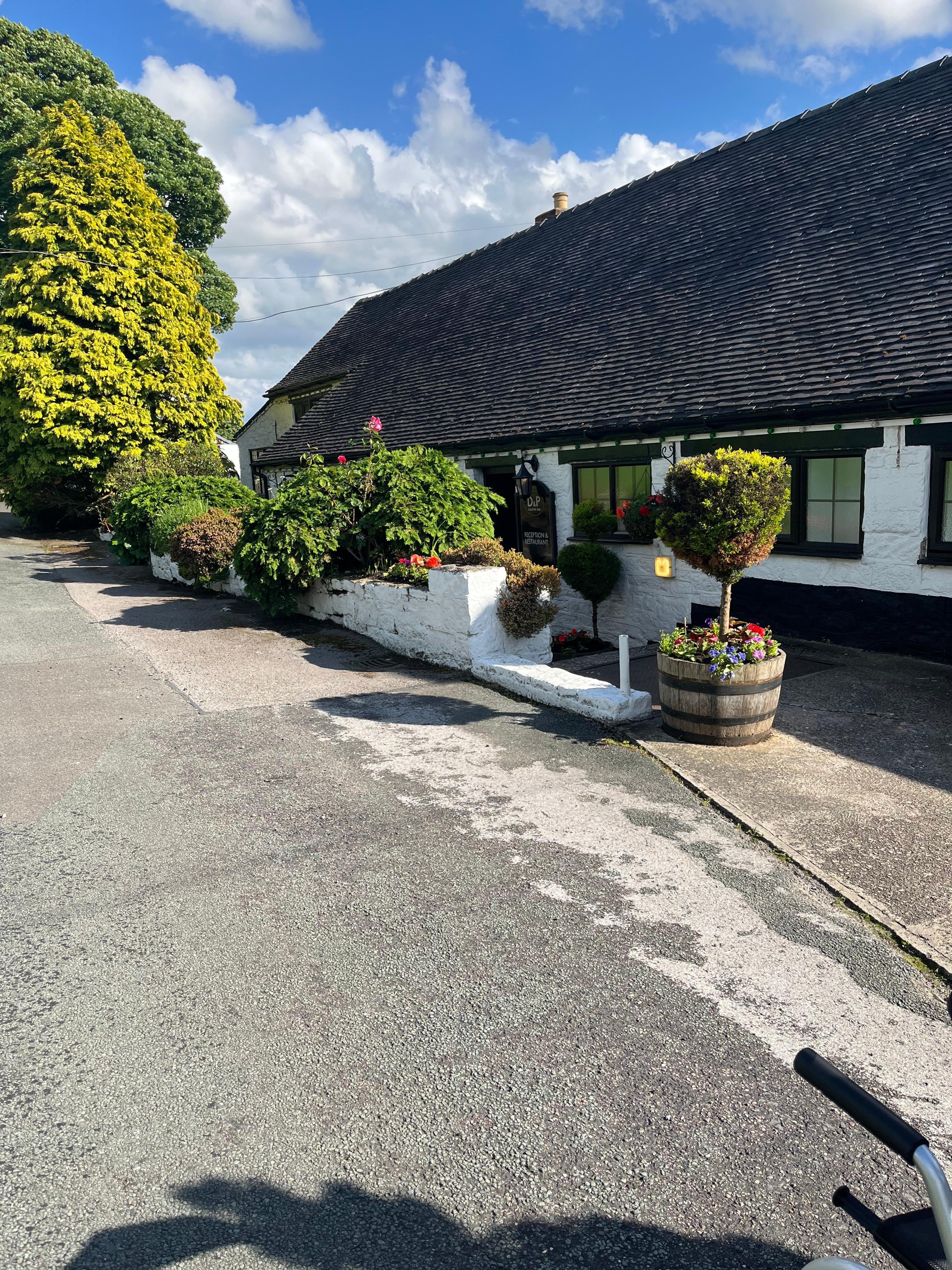 At front of the inn 