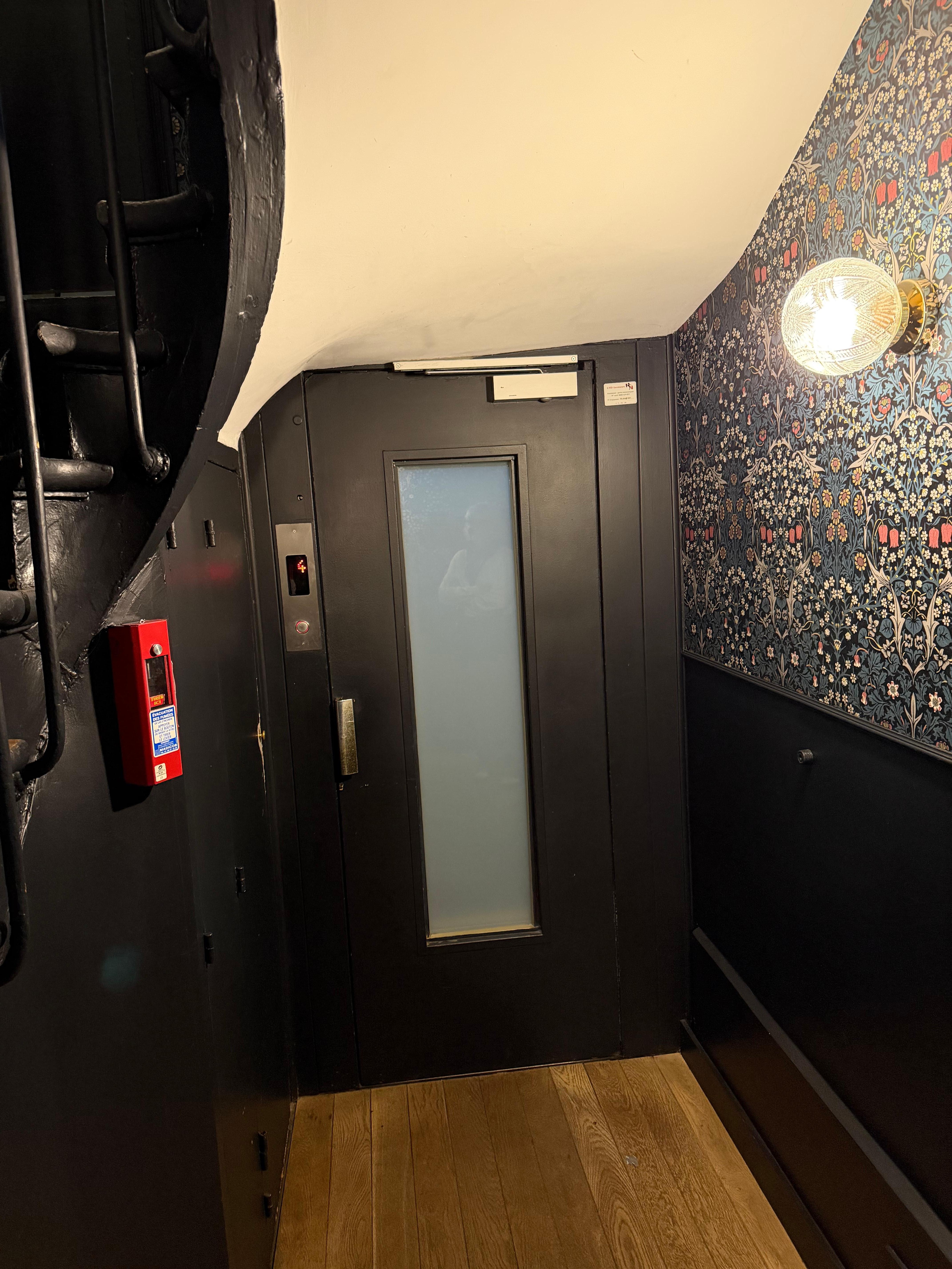 The cozy lift at Hotel Leopold.