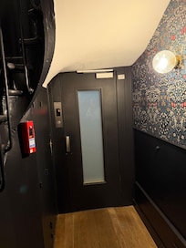The cozy lift at Hotel Leopold.