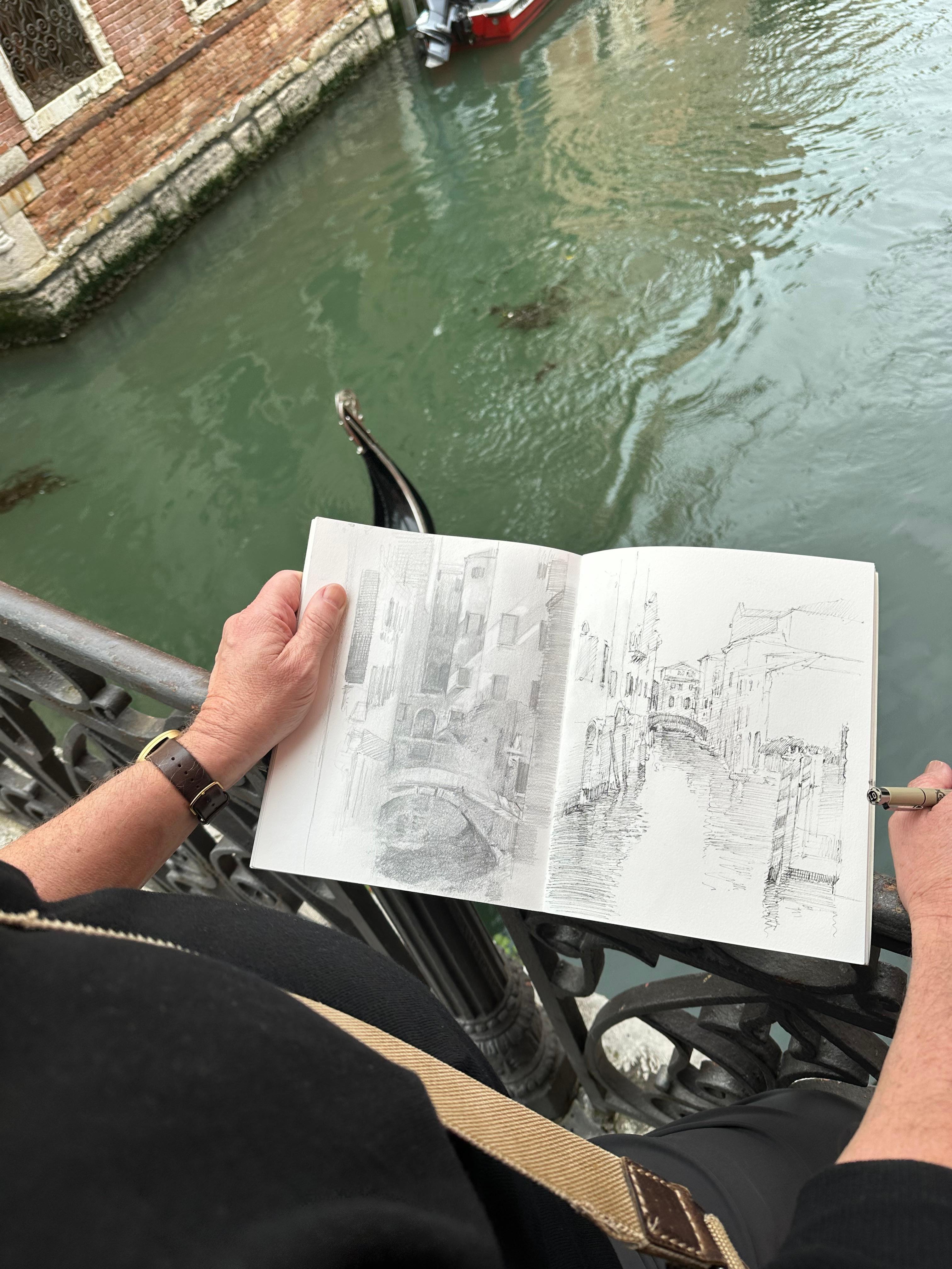 My husband sketching a canal. 